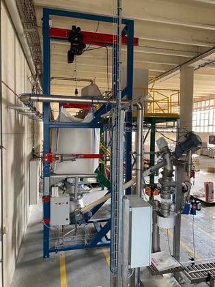 Station de vidange bigbag alimentant en mix semoule le poste d'ensachage des produits finis