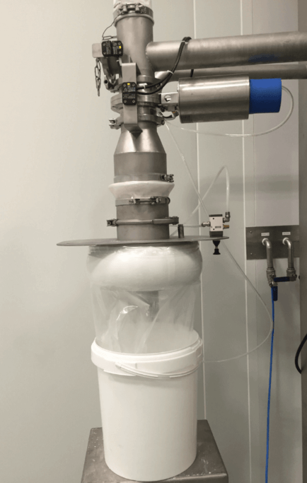 Ensacheuse Peseuse Confinée (EPC) permettant le conditionnement automatique des poudres alimentaires en sacs