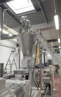 chargement d'un doseur sur une extrudeuse