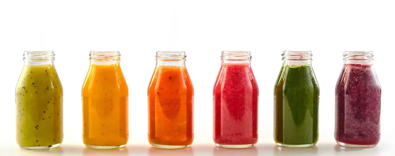 6 contenants en verre présentant une gamme de purées de fruits à destination des professionnels